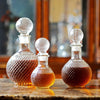 trois carafe a whisky rondes fioles