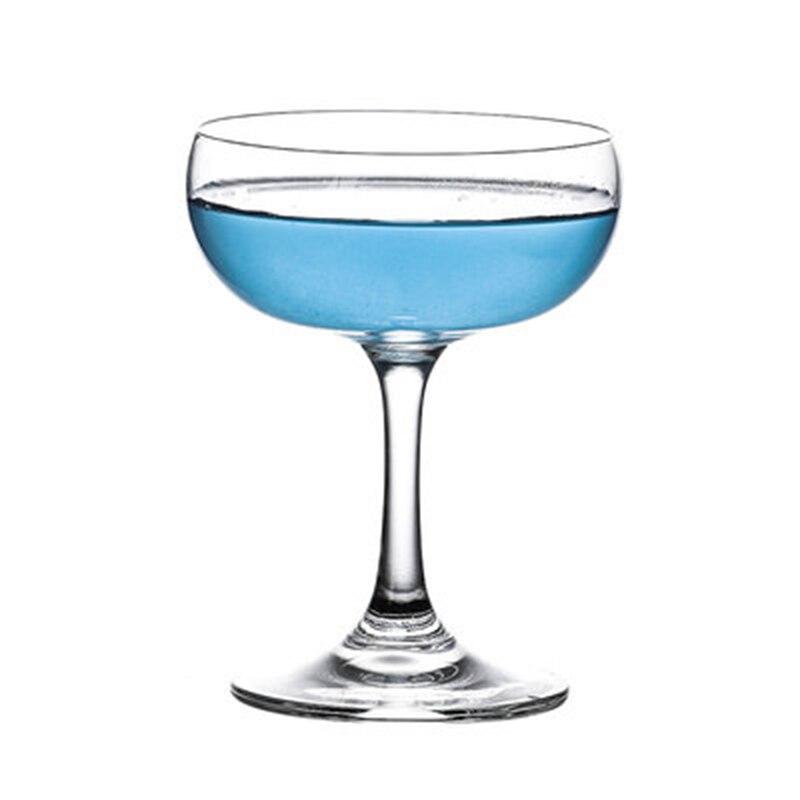 Coupe à cocktail vintage avec un cocktail bleu — bol rond peu profond sur pied fin